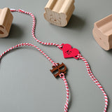 Rakhi - Initial