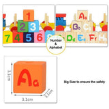 Toddler playing with wooden train toy and rotating alphabet number blocks on floor — Channapatna handcrafted educational toy developing fine motor skills and letter recognition, India
