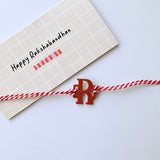 Initial Rakhi