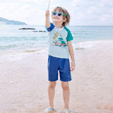 2 Pcs T-Shirt & Shorts Blue "Groovy" Cartoon Print UPF 50+ Kids Swimwear with Matching Swim Cap With Free Wash Bag