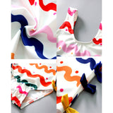 Multi Bows & Waves , Toddlers & Kids Swimwear with matching Swim Cap, plus Free Wash Bag & Free Swim Detergent